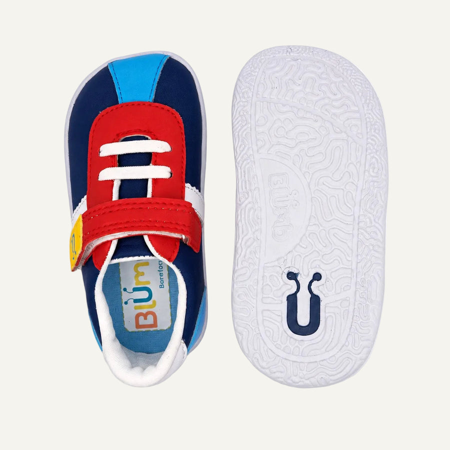 Zapato Barefoot BLUMB VYBE para niño en color zafiro, vista superior y suela